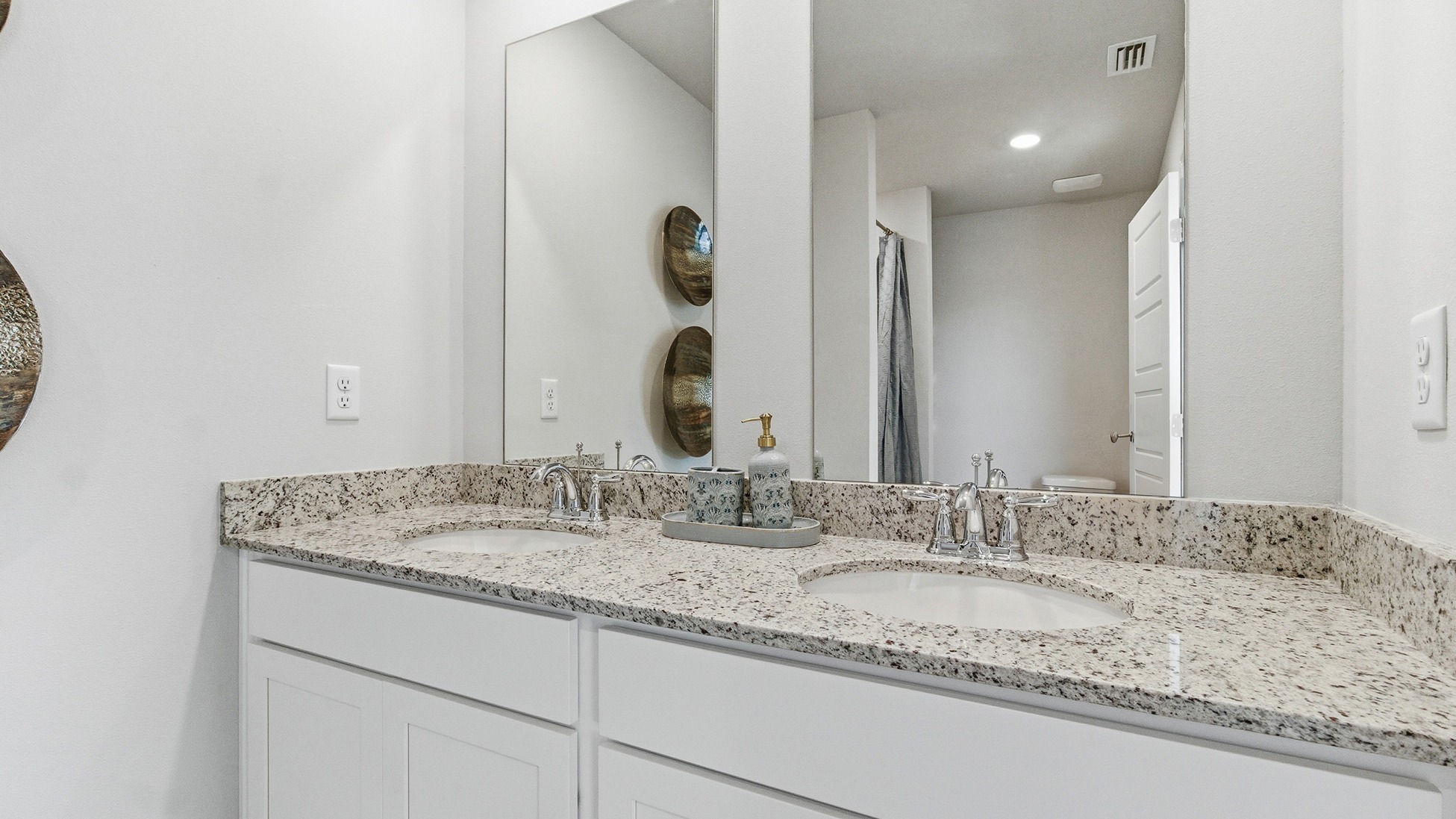 The Palm A is a modern and spacious 3-bedroom, 2 ½-bathroom end-unit townhome with an attached garage.