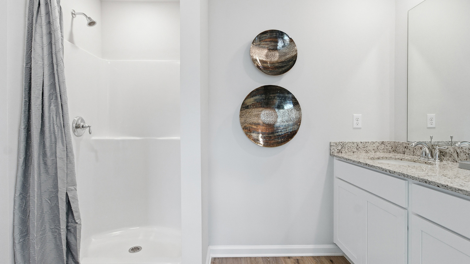 a modern and spacious 3-bedroom 2 ½-bathroom townhome