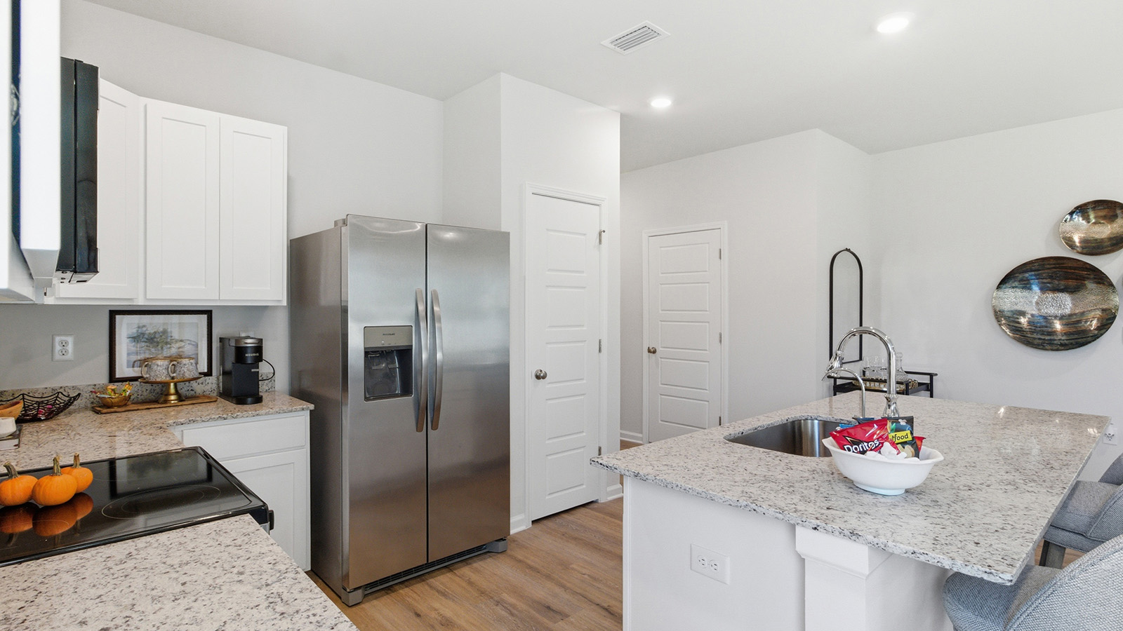 a modern and spacious 3-bedroom 2 ½-bathroom townhome