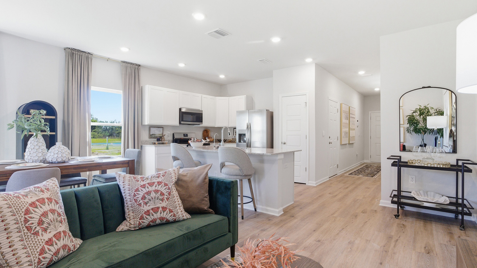 a modern and spacious 3-bedroom 2 ½-bathroom townhome