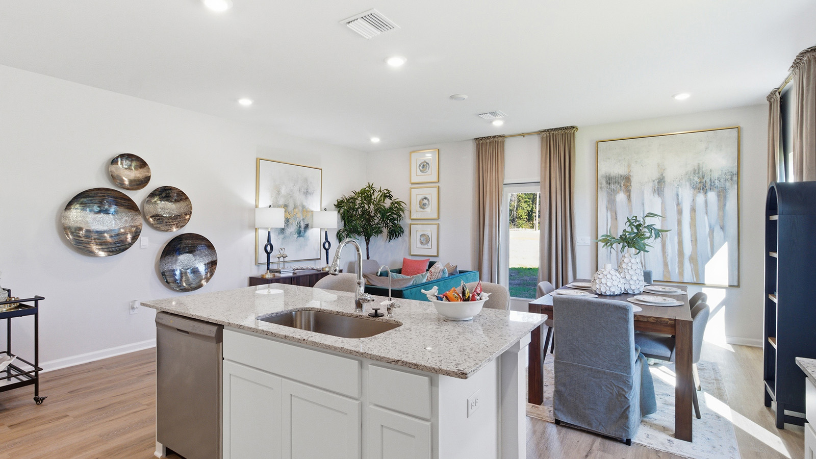 a modern and spacious 3-bedroom 2 ½-bathroom townhome