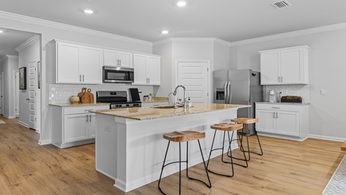 Kitchen with white cabinets