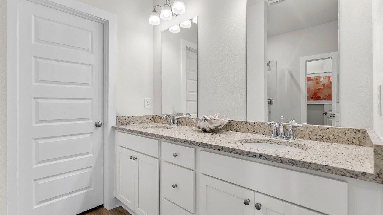 This floorplan features 4 bedrooms, 3.5 baths within 2,245 sq feet