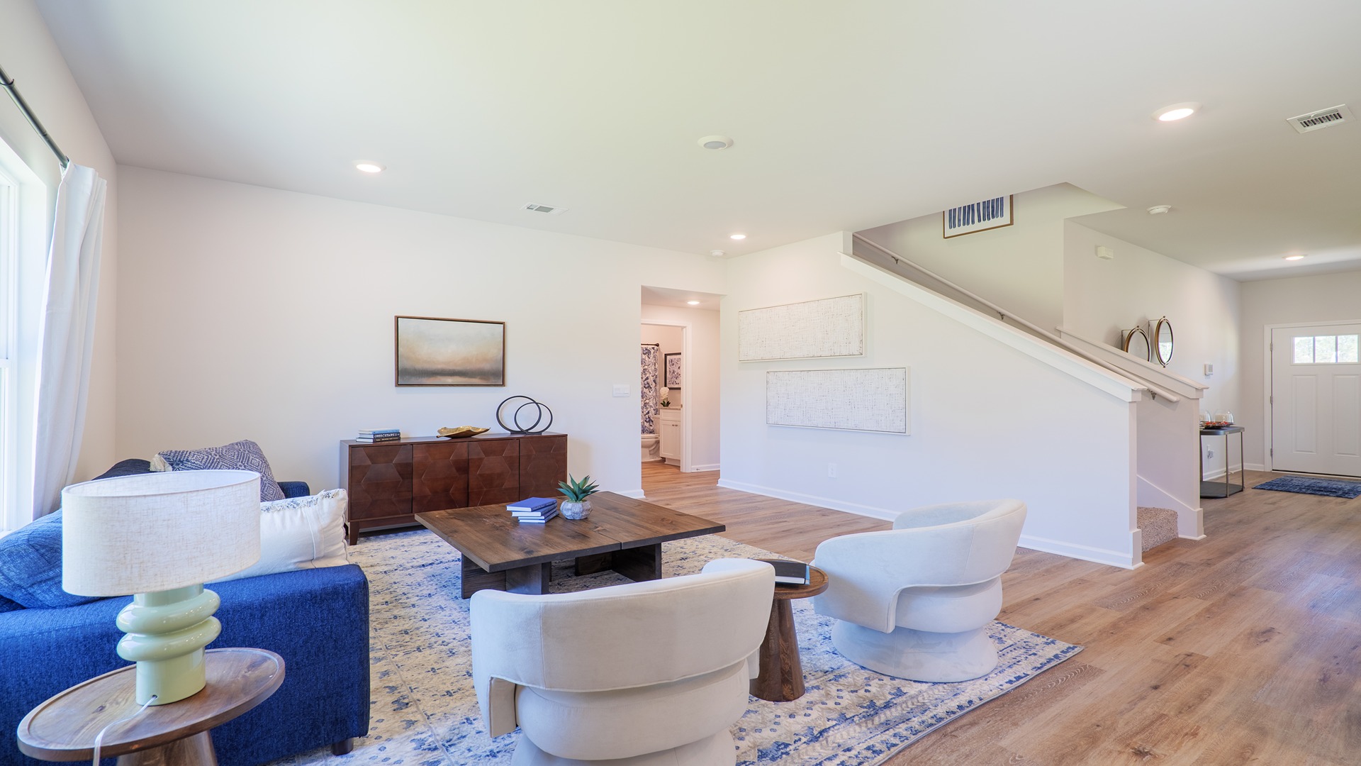 The Carol is a two-story home with 5 bedrooms, 3 bathrooms, and a two-car garage