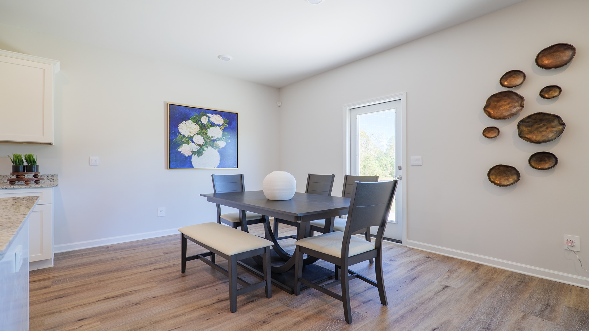 The Carol is a two-story home with 5 bedrooms, 3 bathrooms, and a two-car garage