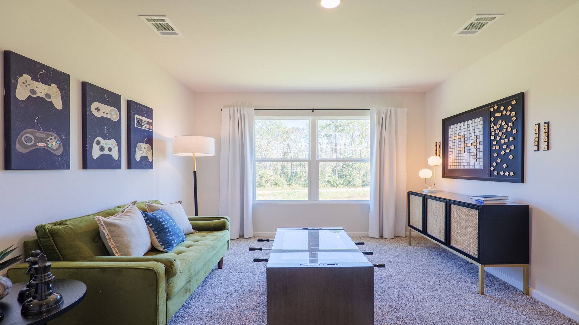 The Carol is a two-story home with 5 bedrooms, 3 bathrooms, and a two-car garage