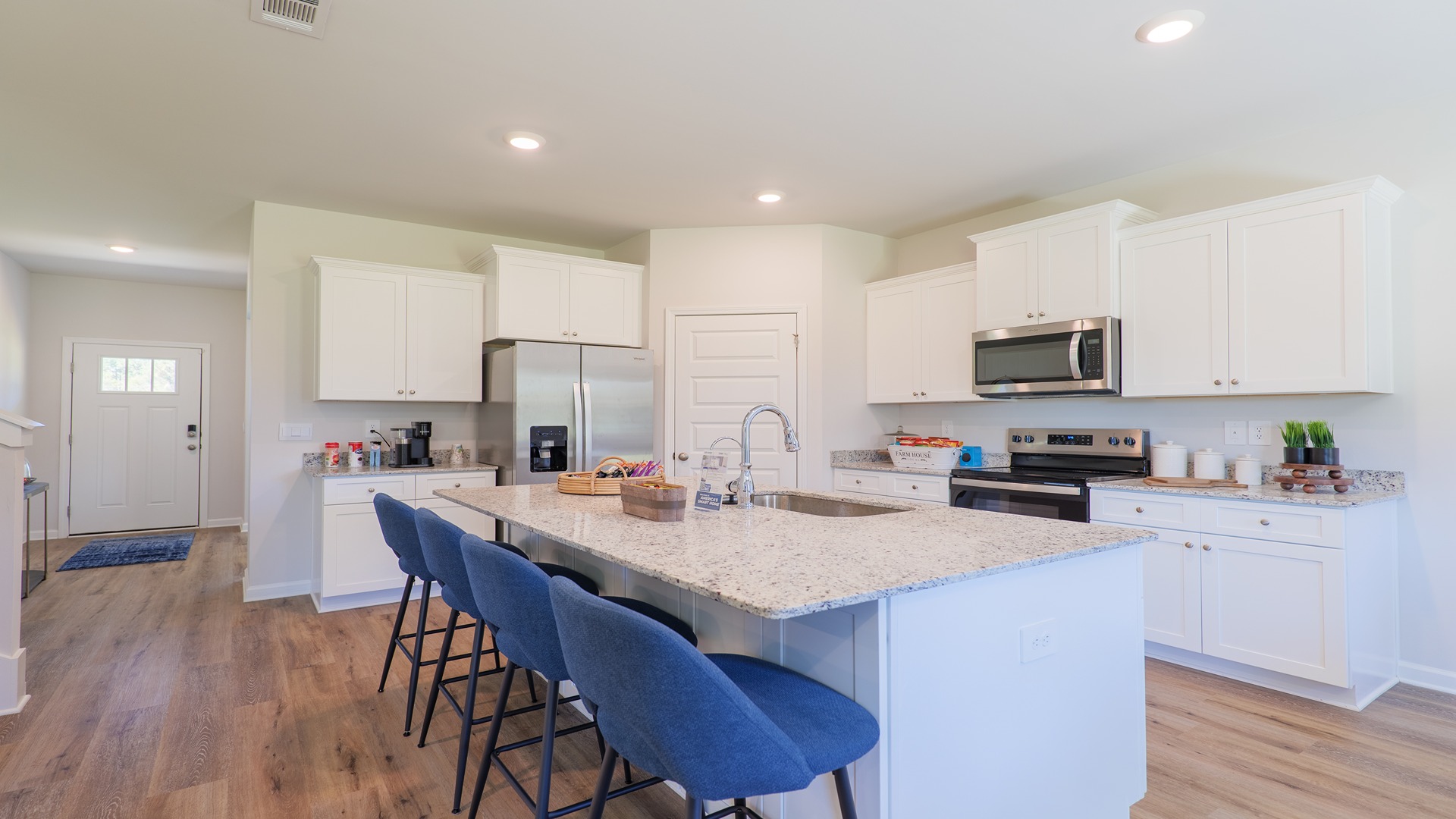 The Carol is a two-story home with 5 bedrooms, 3 bathrooms, and a two-car garage