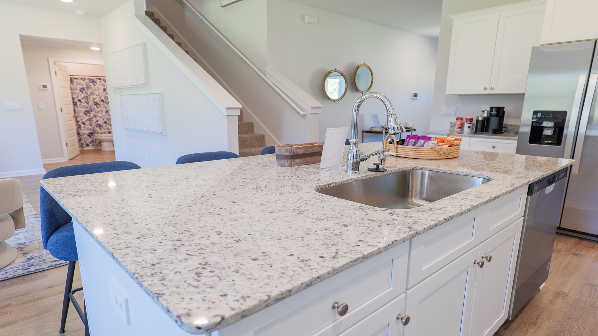 The Carol is a two-story home with 5 bedrooms, 3 bathrooms, and a two-car garage