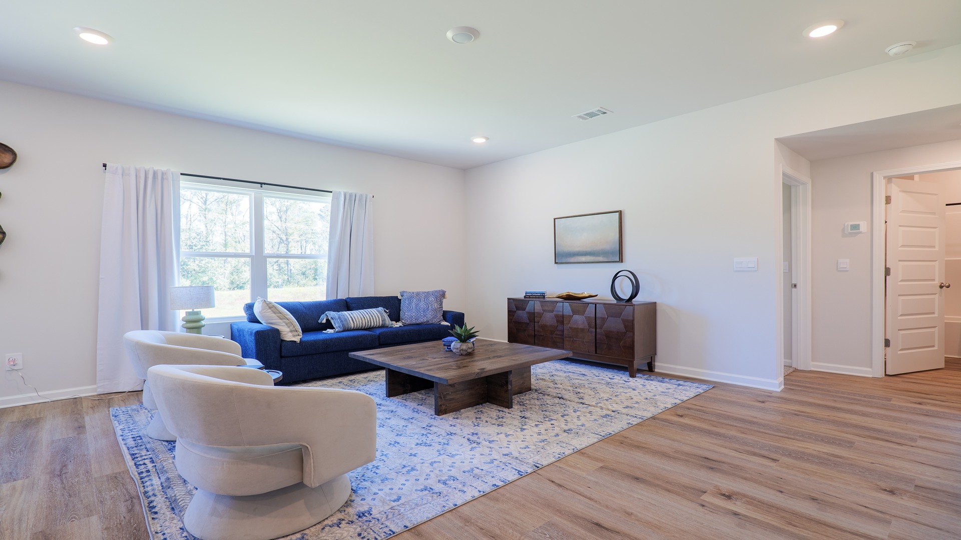 The Carol is a two-story home with 5 bedrooms, 3 bathrooms, and a two-car garage