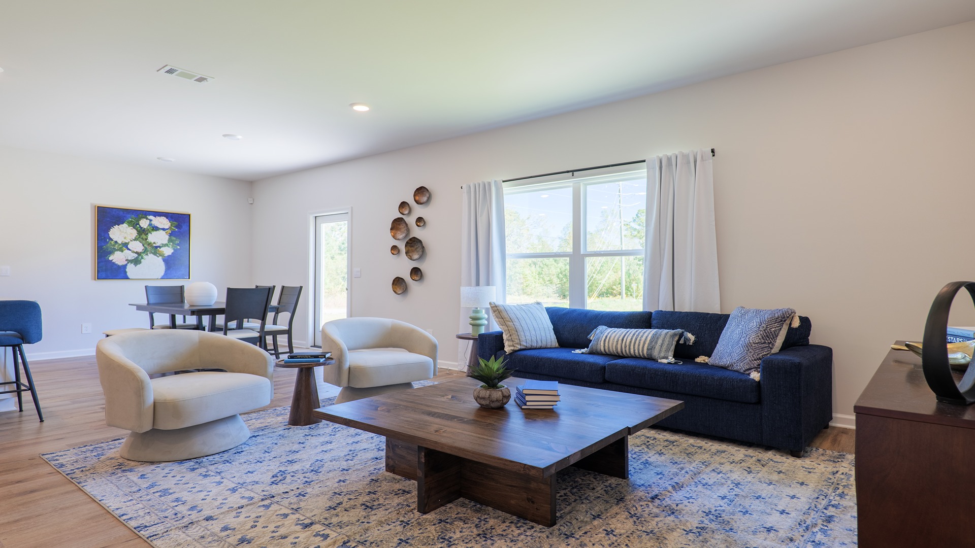 The Carol is a two-story home with 5 bedrooms, 3 bathrooms, and a two-car garage