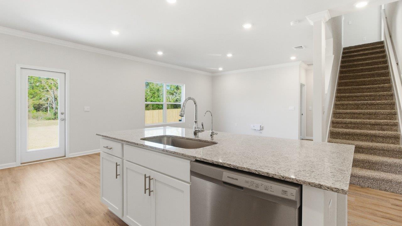 The Carol is a two-story home with 5 bedrooms, 3 bathrooms