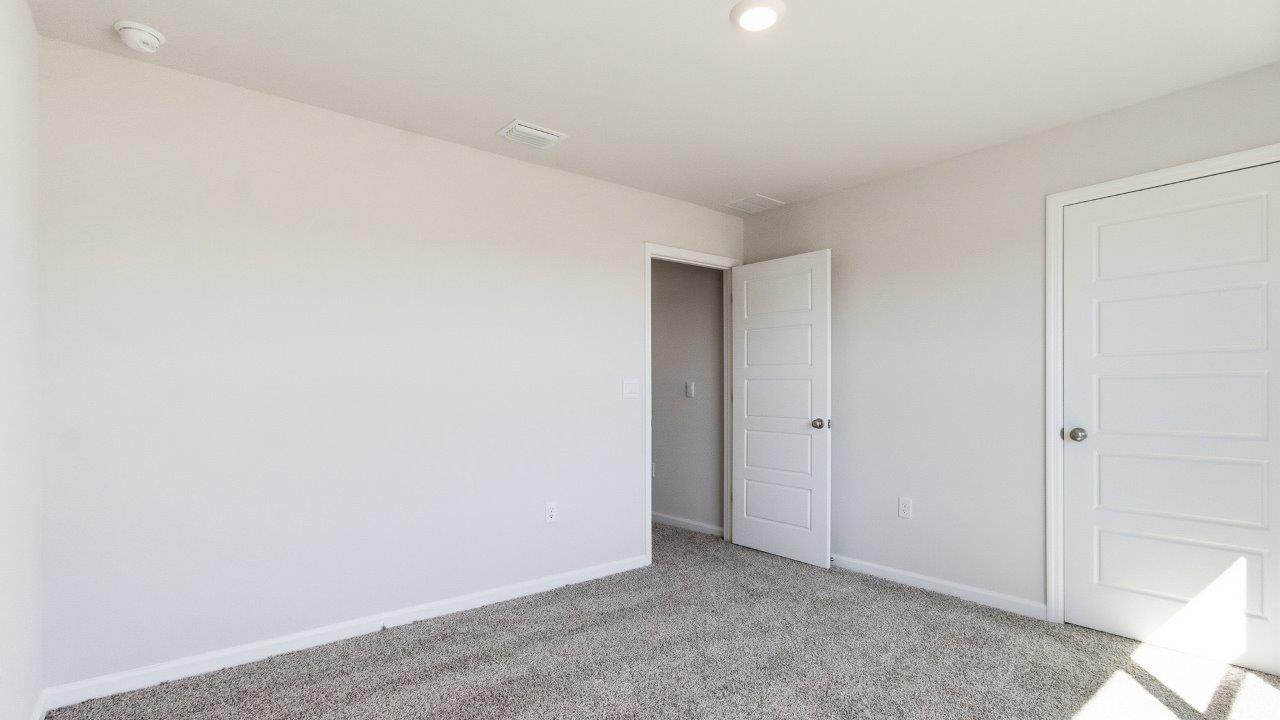 The Carol is a two-story home with 5 bedrooms, 3 bathrooms