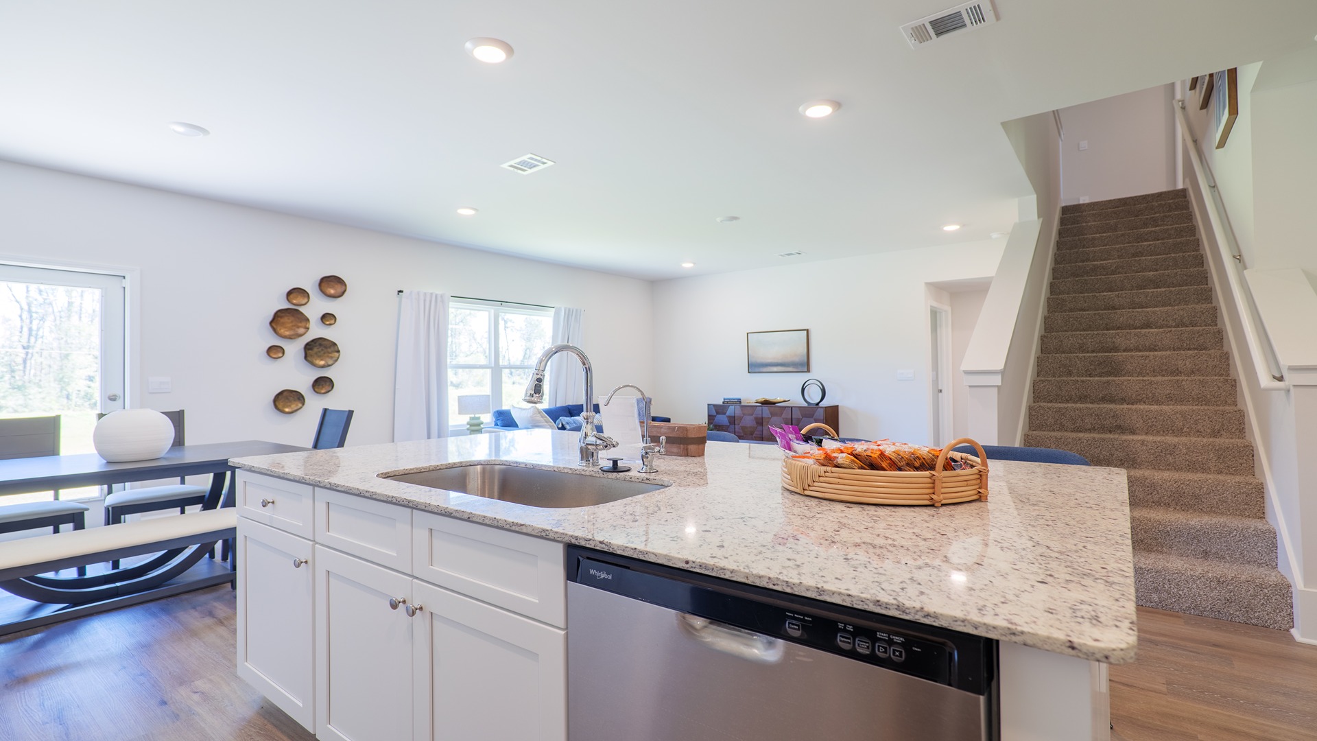 The Carol is a two-story home with 5 bedrooms, 3 bathrooms, and a two-car garage