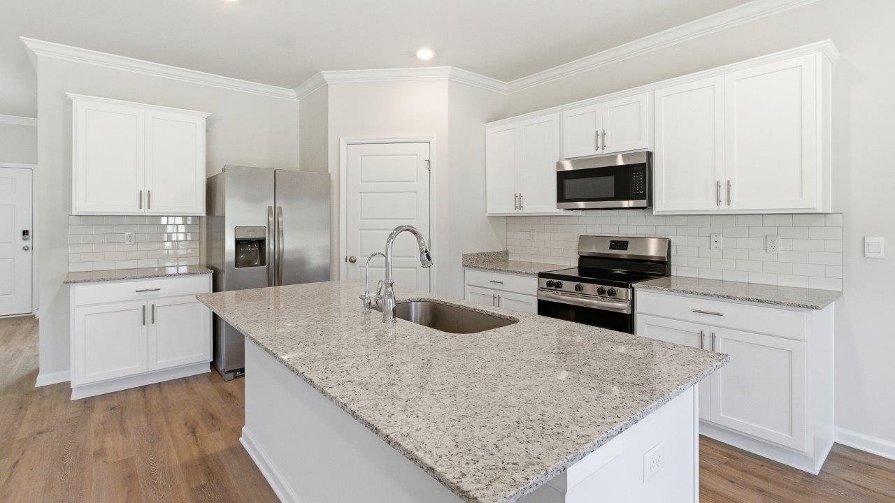 The Carol is a two-story home with 5 bedrooms, 3 bathrooms, and a two-car garage