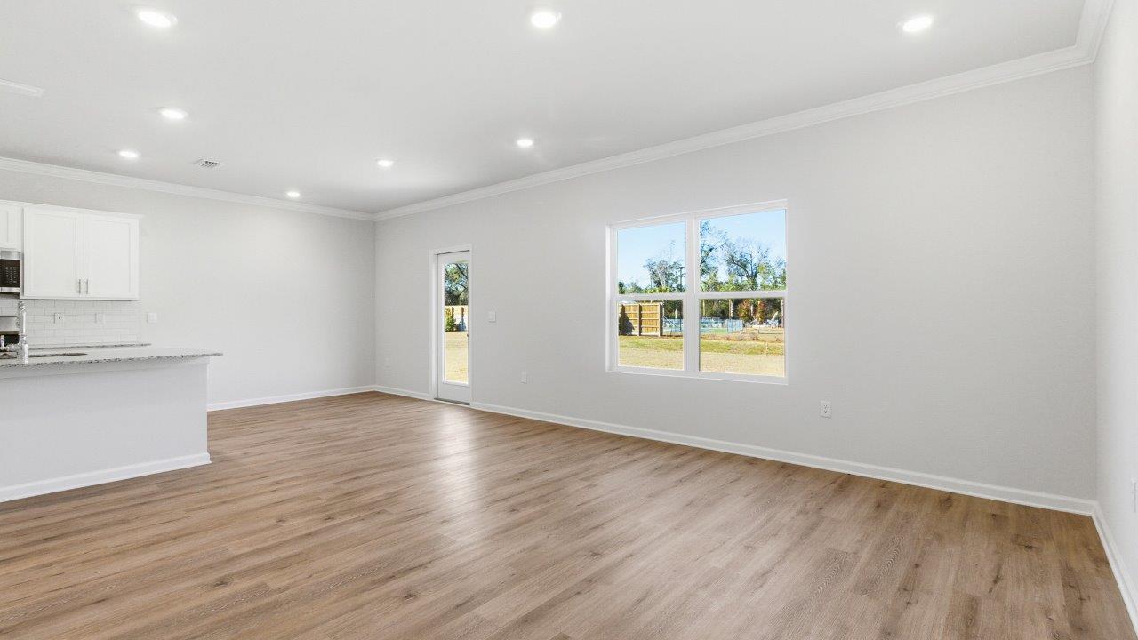 The Carol is a two-story home with 5 bedrooms, 3 bathrooms, and a two-car garage