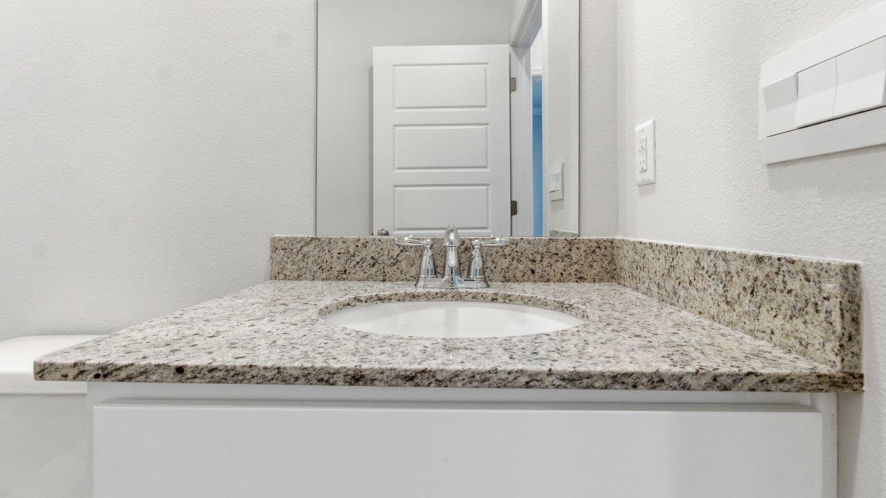 The Carol is a two-story home with 5 bedrooms, 3 bathrooms, and a two-car garage