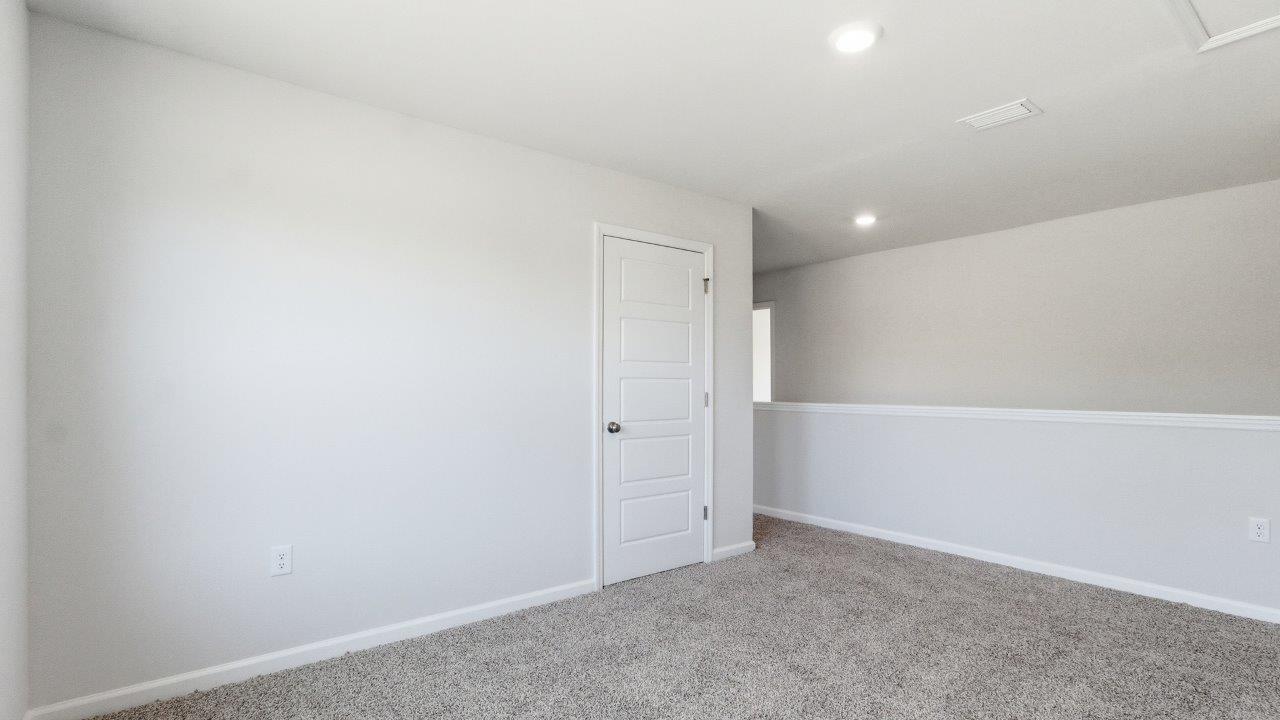 The Carol is a two-story home with 5 bedrooms, 3 bathrooms, and a two-car garage