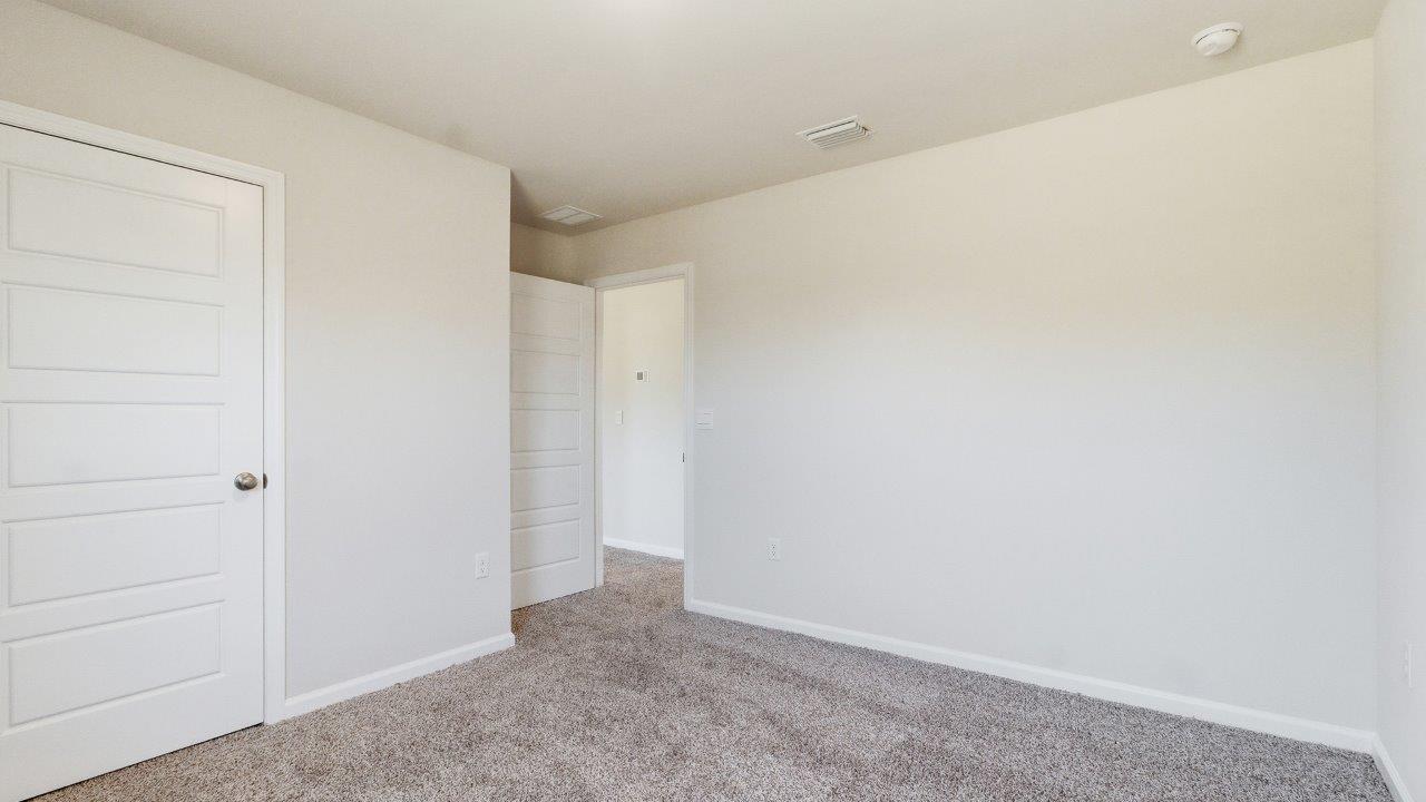 The Carol is a two-story home with 5 bedrooms, 3 bathrooms, and a two-car garage