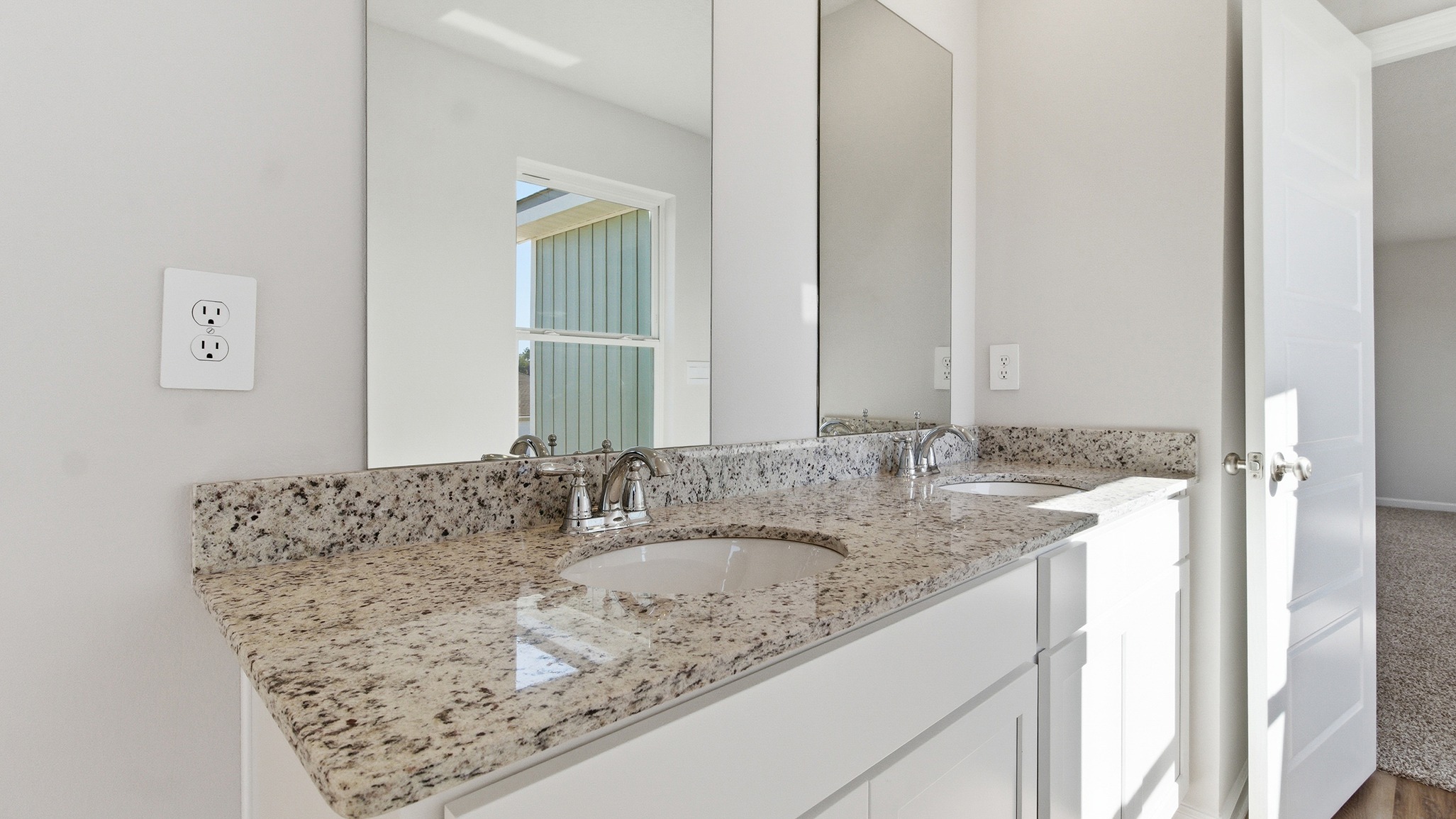 This thoughtfully crafted two-story single-family home offers 2,416 square feet of comfortable, modern living with 4 bedrooms, 2.5 bathrooms