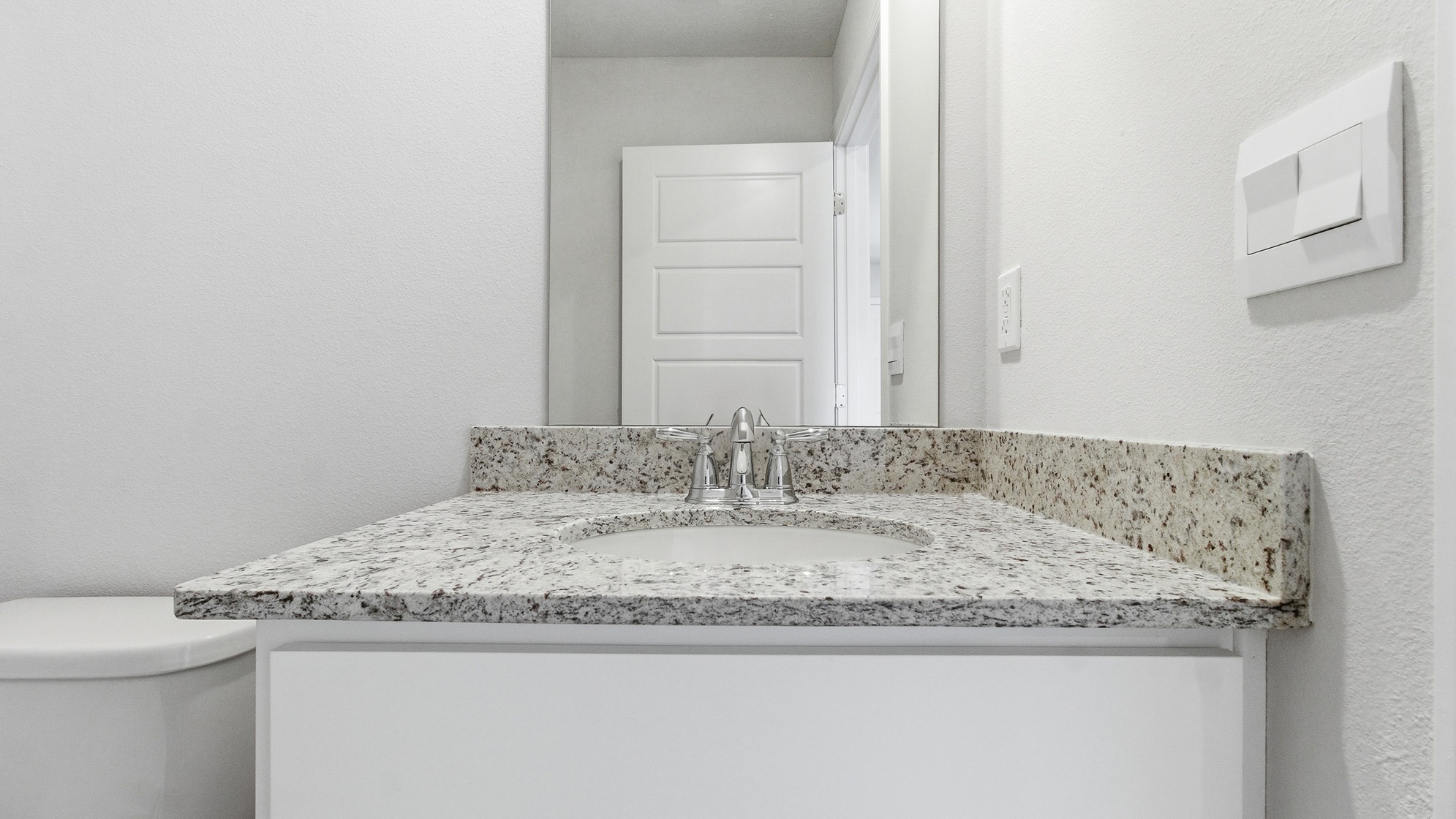 This thoughtfully crafted two-story single-family home offers 2,416 square feet of comfortable, modern living with 4 bedrooms, 2.5 bathrooms