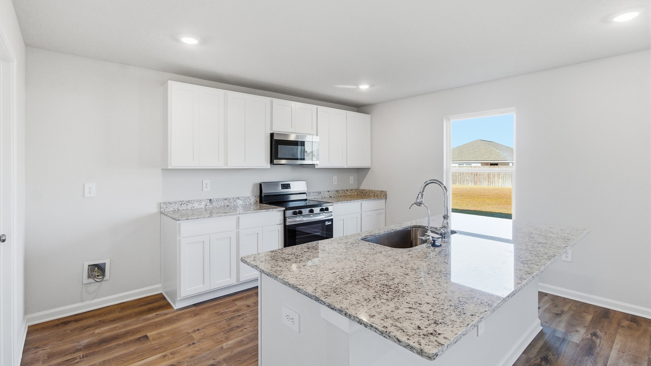 This thoughtfully crafted two-story single-family home offers 2,416 square feet of comfortable, modern living with 4 bedrooms, 2.5 bathrooms