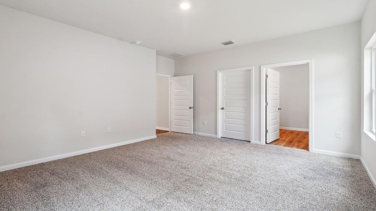 Empty primary bedroom