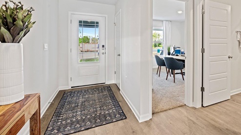 As you enter the Cali, the foyer leads to the beautiful open kitchen featuring a spacious walk-in pantry and large island that overlooks the dining and living room combination, creating the perfect space for entertaining.