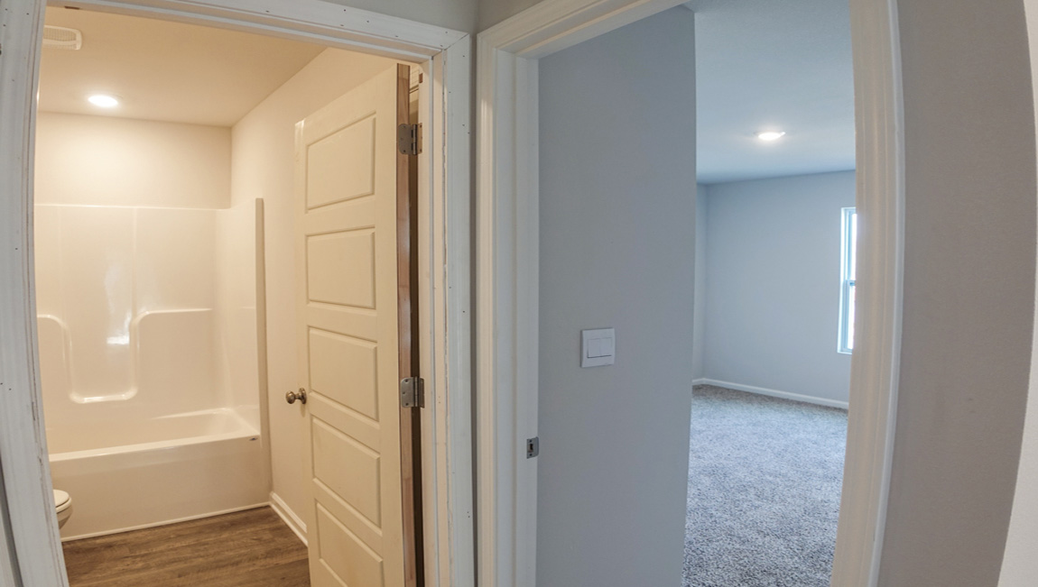 The Lismore plan is a single-story, 3 bed, 2 bath layout, spanning approximately 1,580 square feet