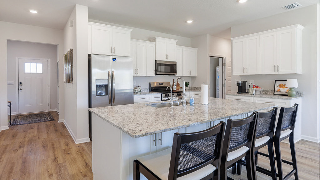 The Belfort is a 4-bedroom, 2.5-bathroom two-story home with over 2200 Sq. Ft. and a two-car garage.