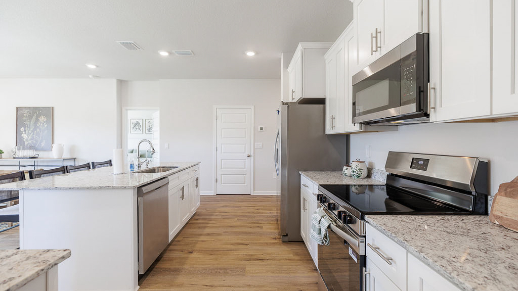 The Belfort is a 4-bedroom, 2.5-bathroom two-story home with over 2200 Sq. Ft. and a two-car garage.