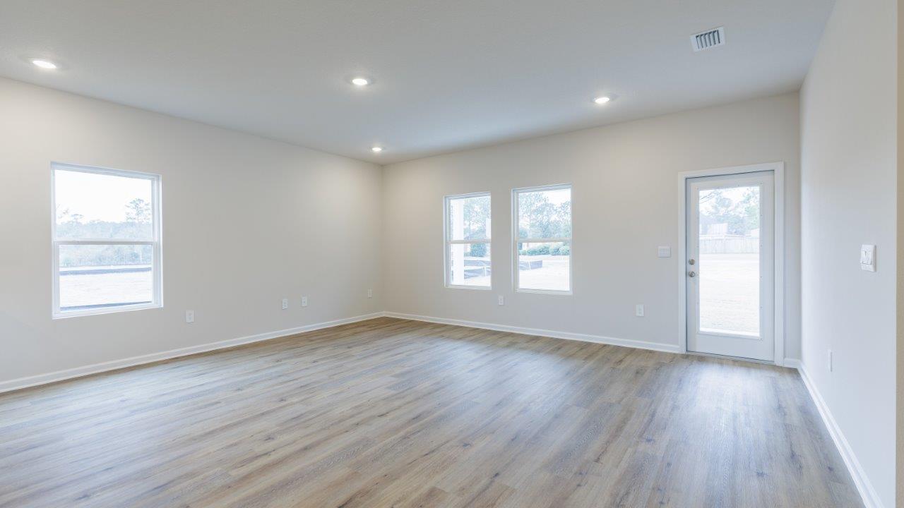 The Ozark floorplan features 4 bedrooms, 3 bathrooms, and approximately 2,458 square feet