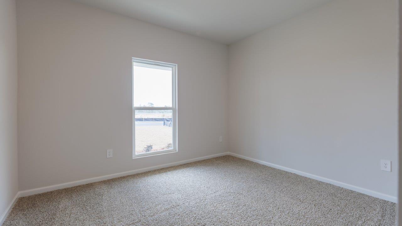 The Ozark floorplan features 4 bedrooms, 3 bathrooms, and approximately 2,458 square feet