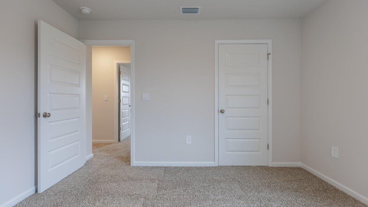 The Ozark floorplan features 4 bedrooms, 3 bathrooms, and approximately 2,458 square feet