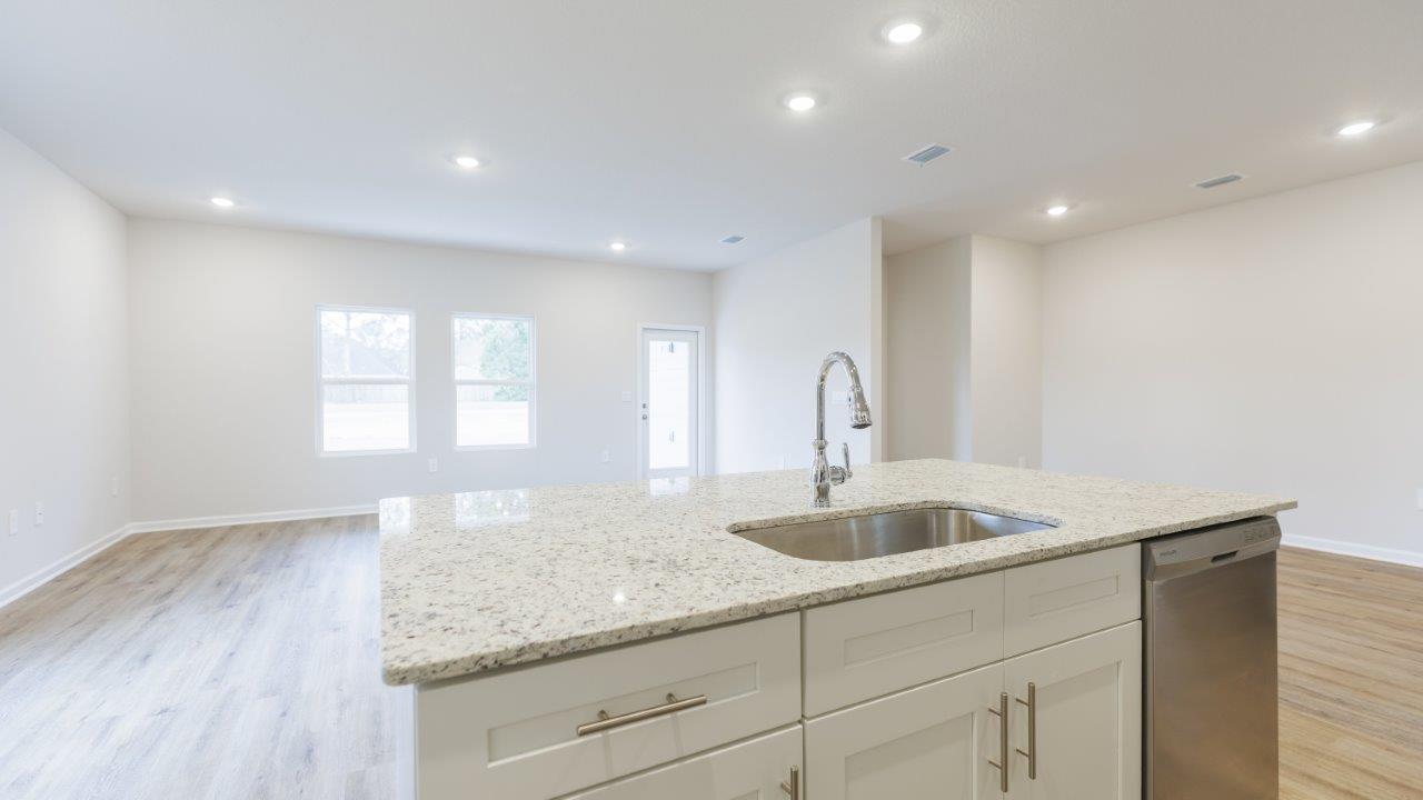 This floorplan features 4 bedrooms, 3 bathrooms, and approximately 2,458 square feet