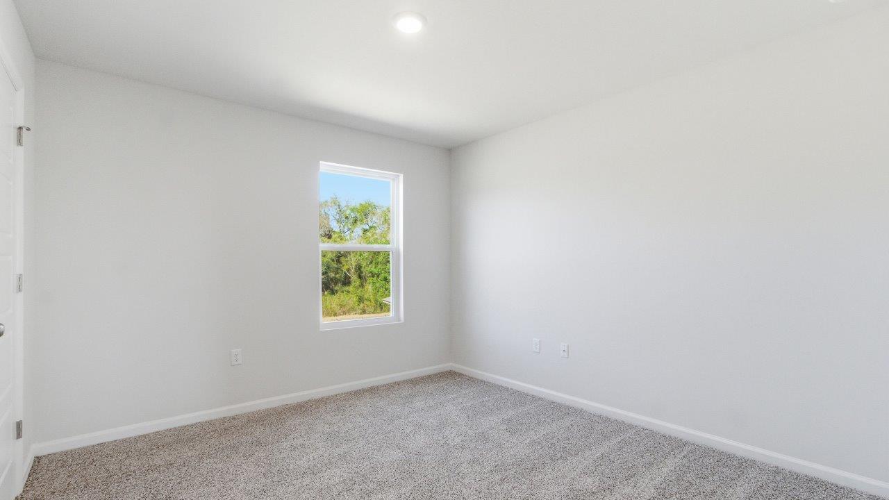 a two-story home with 5 bedrooms, 3 bathrooms, and a two-car garage