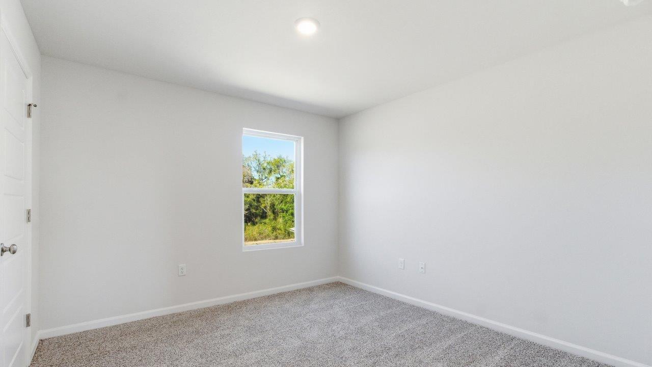 a two-story home with 5 bedrooms, 3 bathrooms, and a two-car garage