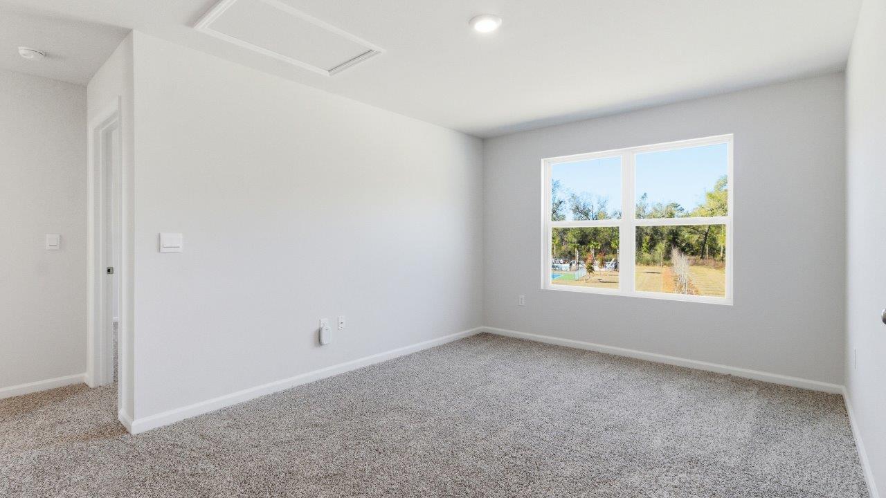 a two-story home with 5 bedrooms, 3 bathrooms, and a two-car garage