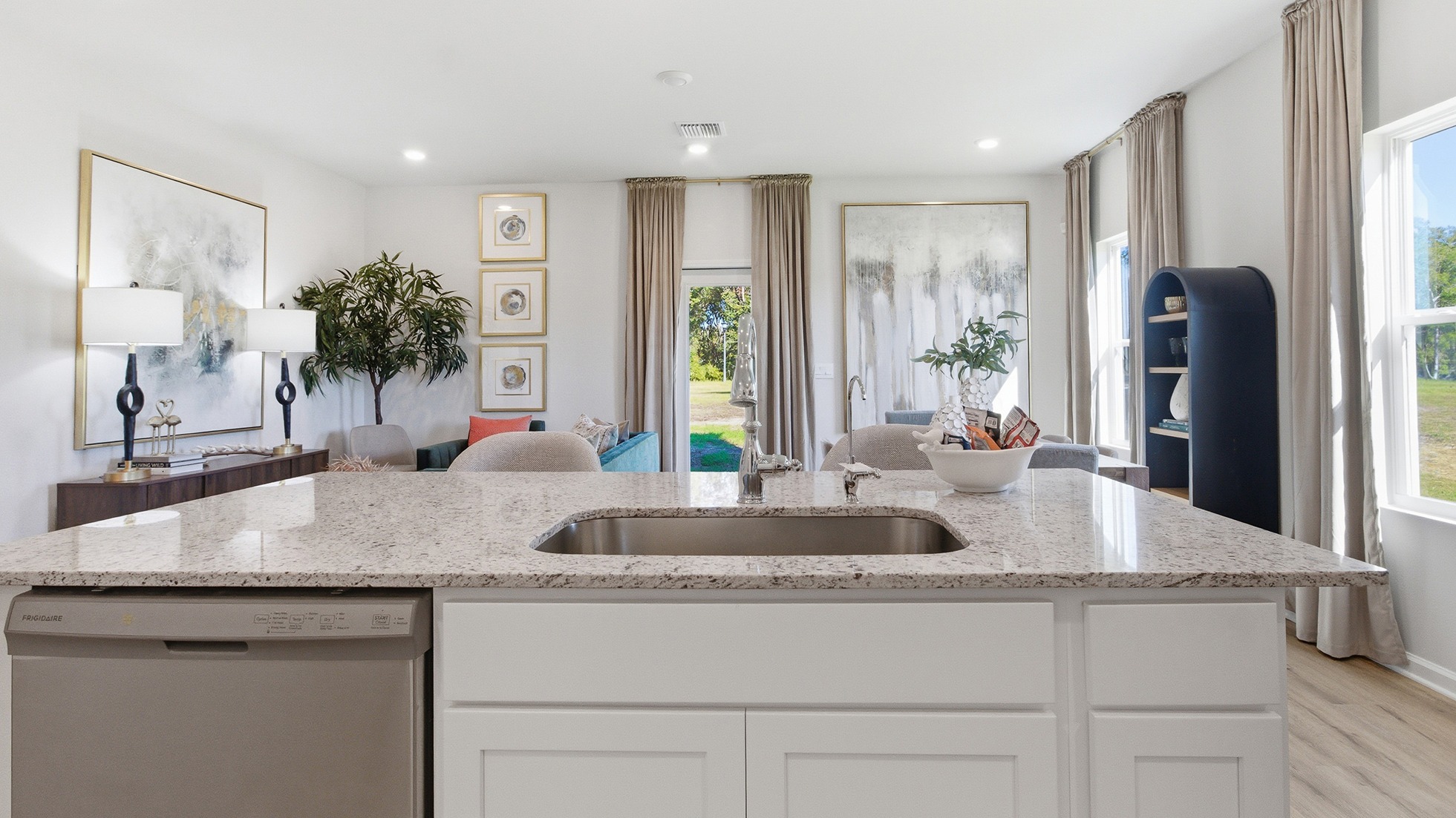 This modern and spacious floorplan features a 3-bedroom, 2 ½-bathroom end-unit townhome