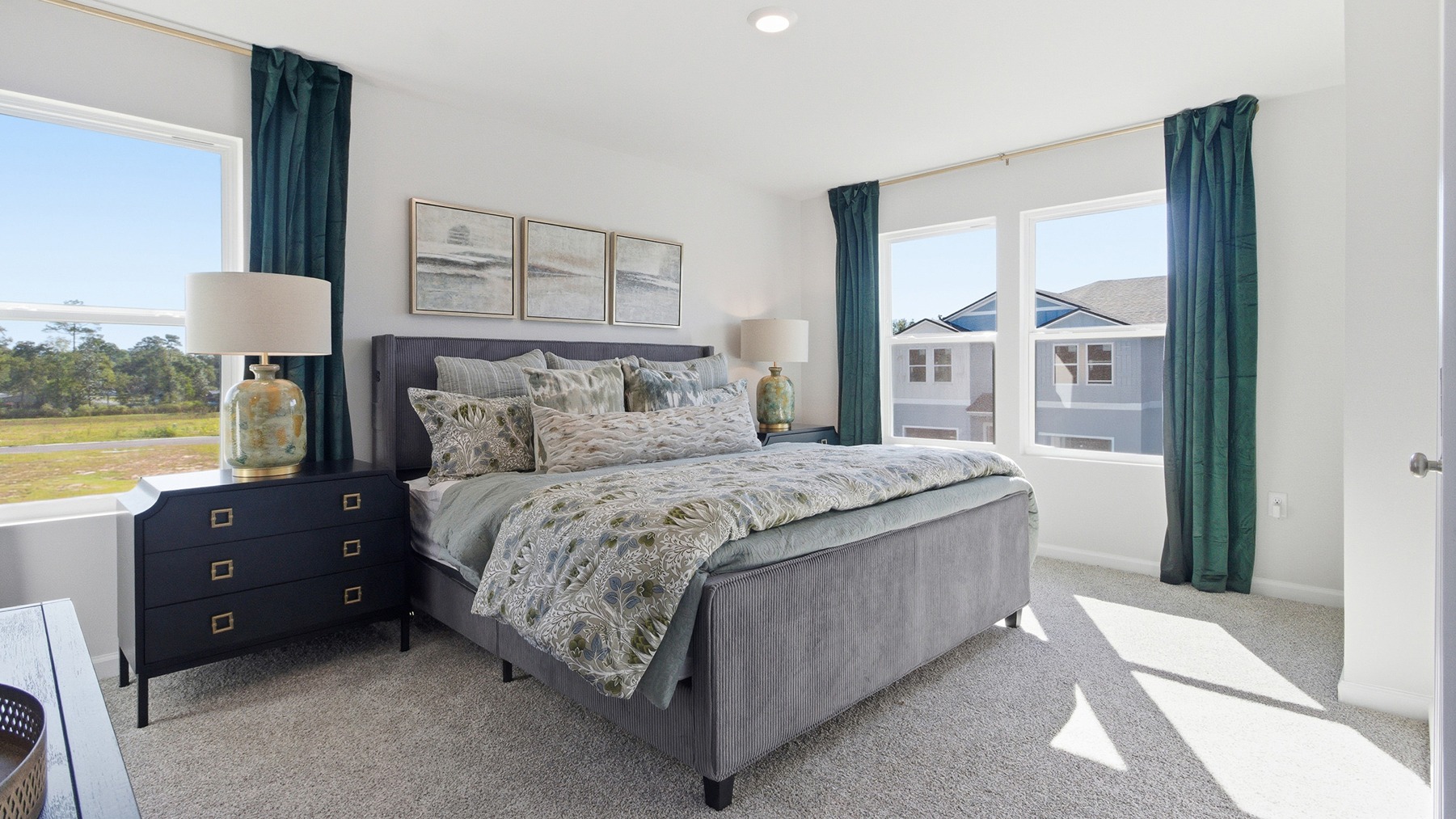 This modern and spacious floorplan features a 3-bedroom, 2 ½-bathroom end-unit townhome