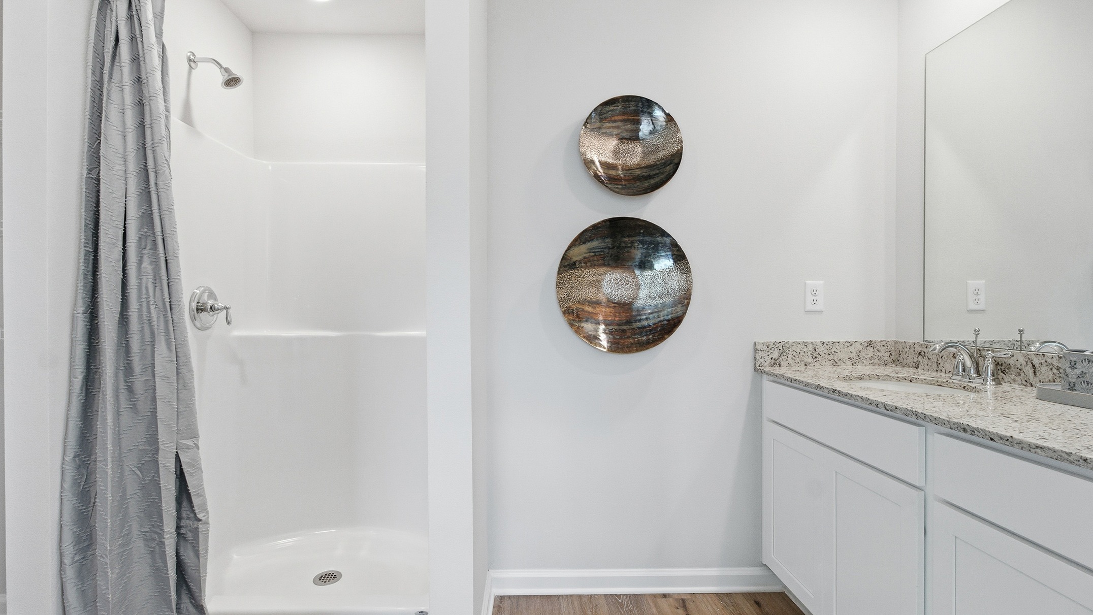 This modern and spacious floorplan features a 3-bedroom, 2 ½-bathroom end-unit townhome