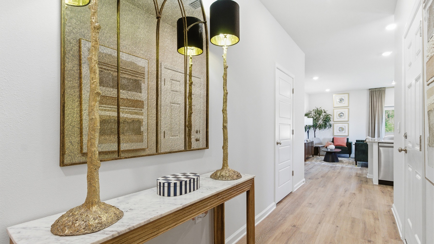 This modern and spacious floorplan features a 3-bedroom, 2 ½-bathroom end-unit townhome