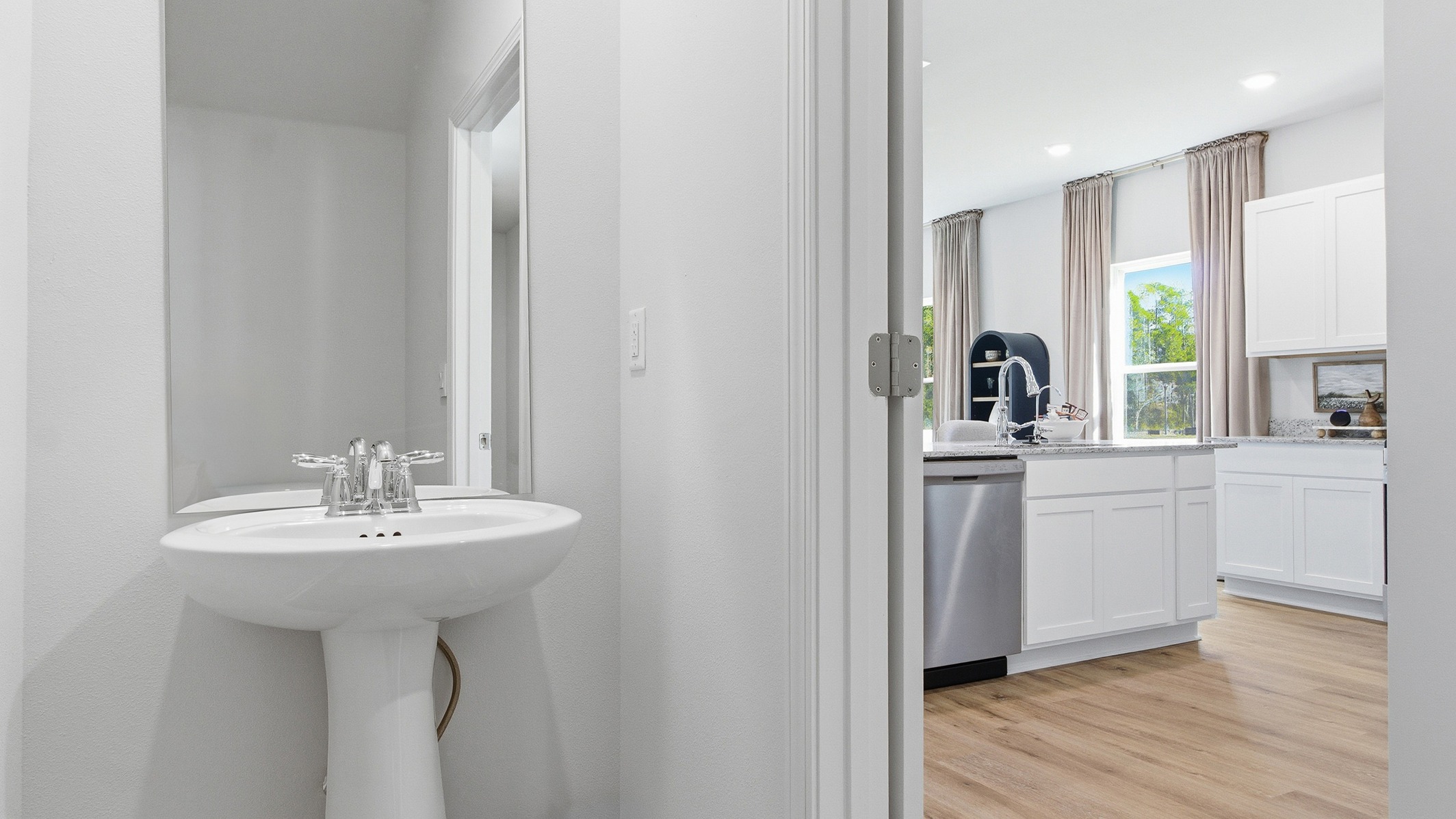 This modern and spacious floorplan features a 3-bedroom, 2 ½-bathroom end-unit townhome