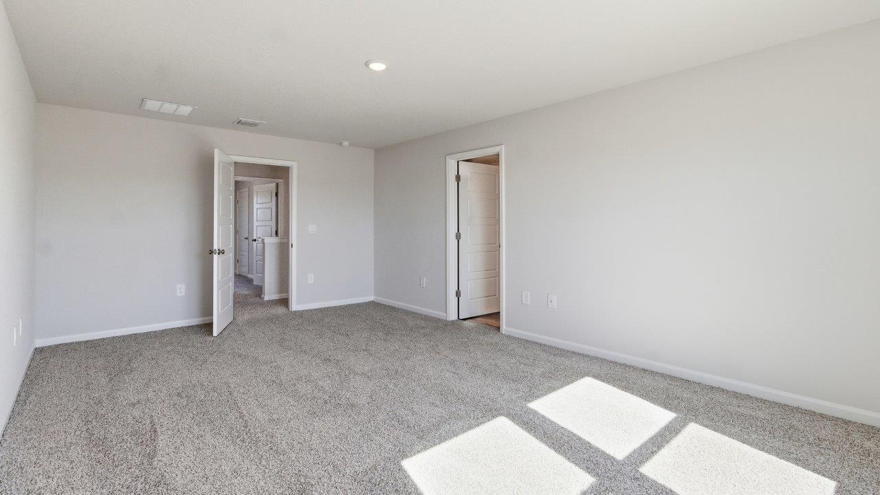 Empty primary bedroom
