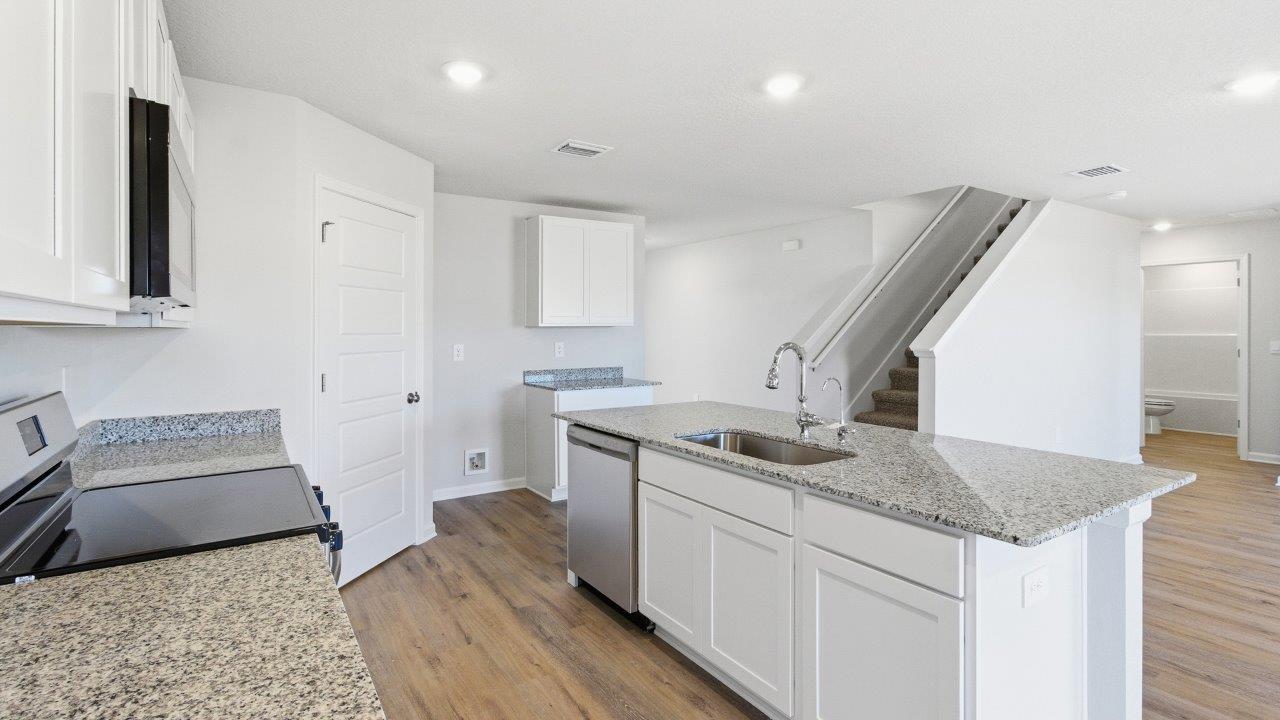 Kitchen overlooking living room