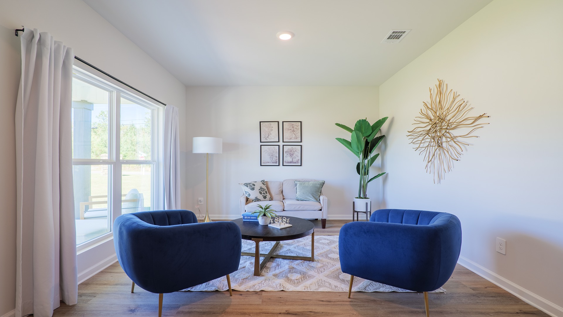 The Carol is a two-story home with 5 bedrooms, 3 bathrooms, and a two-car garage.