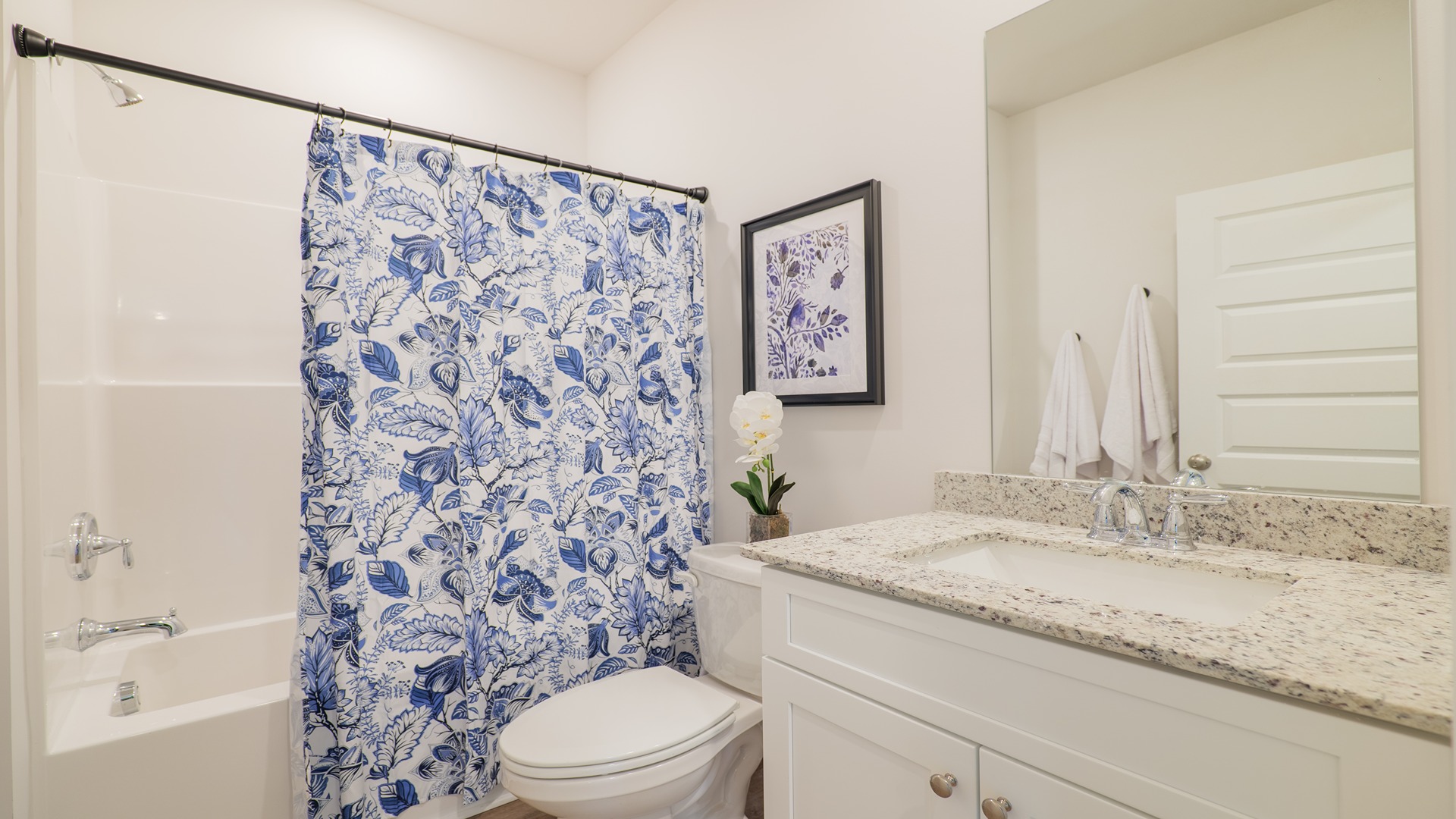 The Carol is a two-story home with 5 bedrooms, 3 bathrooms, and a two-car garage.