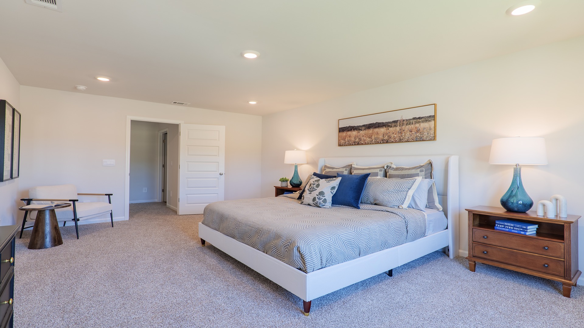 The Carol is a two-story home with 5 bedrooms, 3 bathrooms, and a two-car garage.