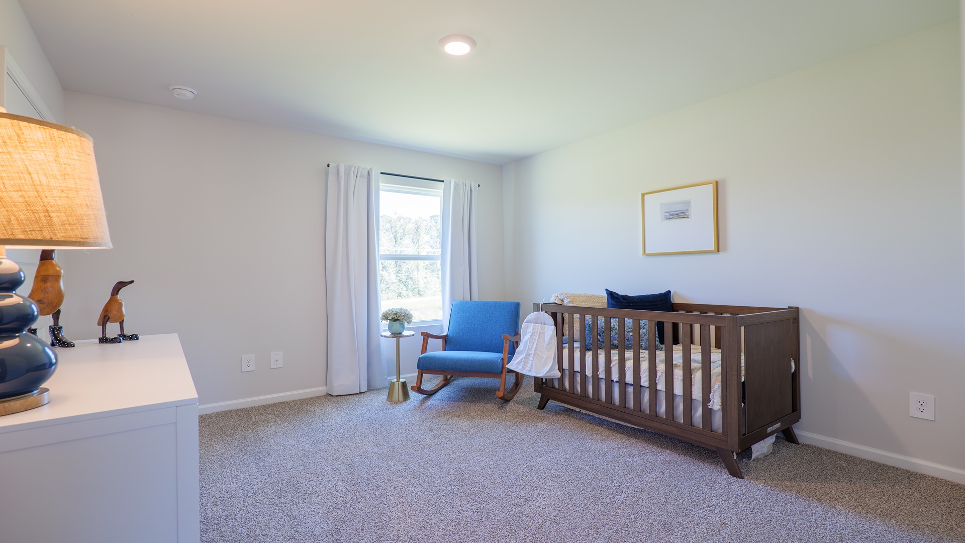 The Carol is a two-story home with 5 bedrooms, 3 bathrooms, and a two-car garage.