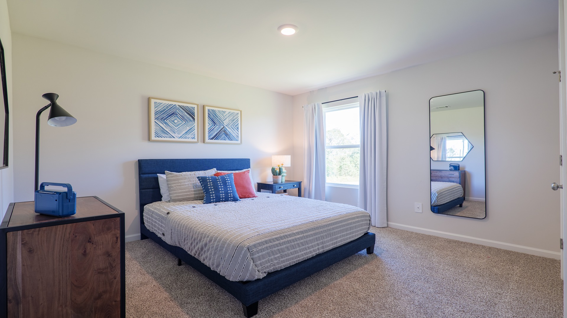 The Carol is a two-story home with 5 bedrooms, 3 bathrooms, and a two-car garage.