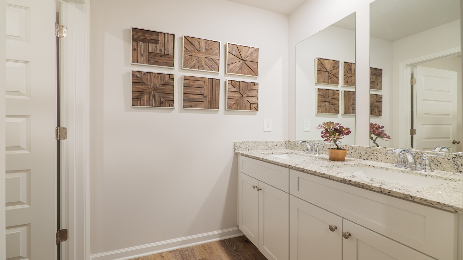 The Carol is a two-story home with 5 bedrooms, 3 bathrooms, and a two-car garage.